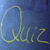Das Wort "Quiz" auf eine Tafel geschrieben