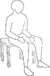 Bild einer Figur auf einem Stuhl